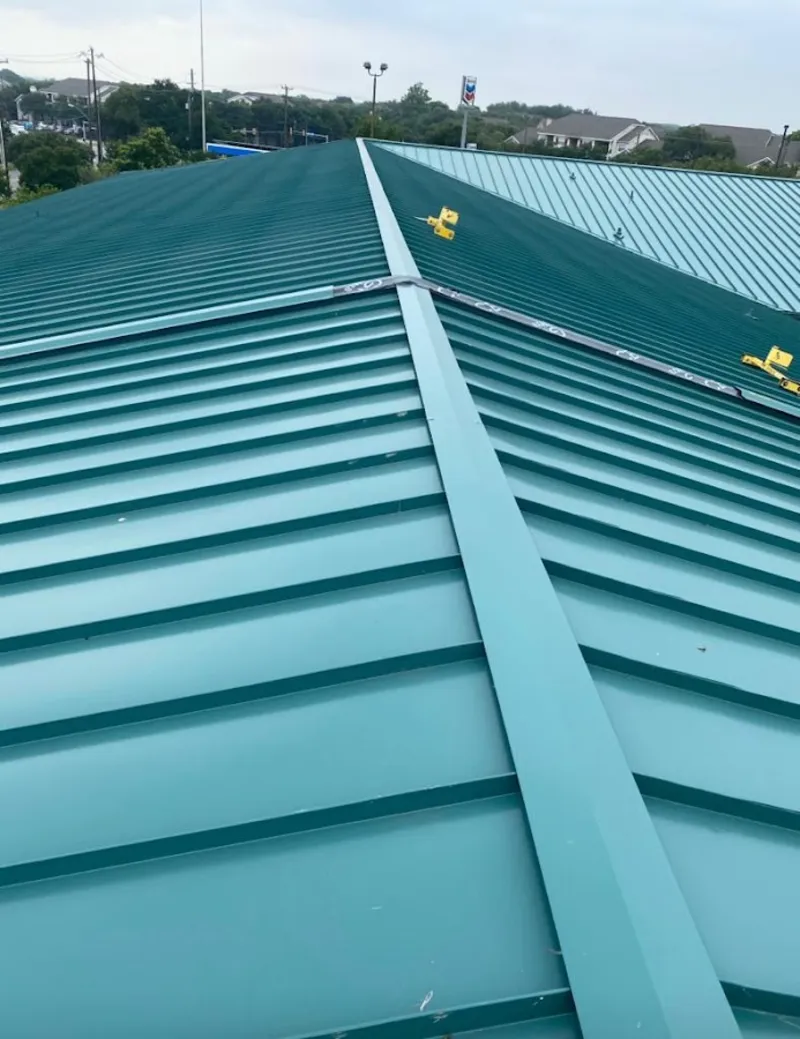 Green commercial metal roof ridge and valley for Metal Roof Repair in Madisonville