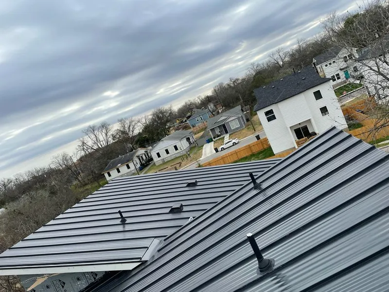 Standing seam metal roof panels with vents for Skylight Repair in Madisonville